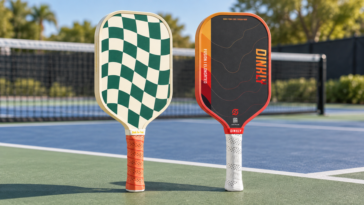 Dinkly Play and Dinkly Fusion Elongated paddles on a sunlit pickleball court